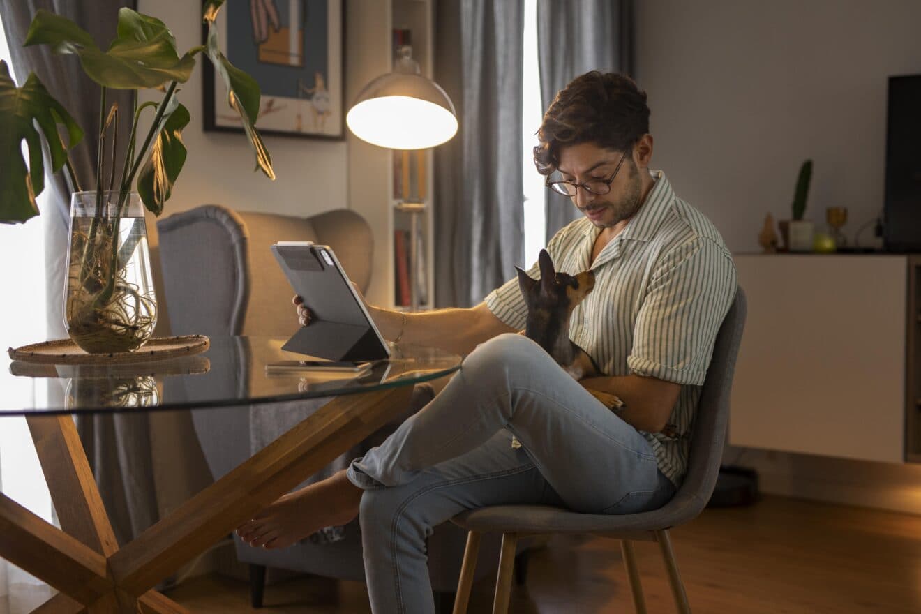 person-working-from-home-with-pet-dog
